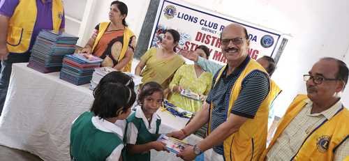 Book distribution to students by LC Rayagada